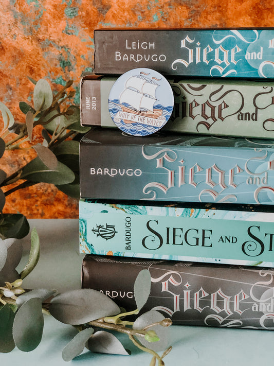 wolf of the waves sturmhond shadow and bone enamel pin with pirate ship on waves