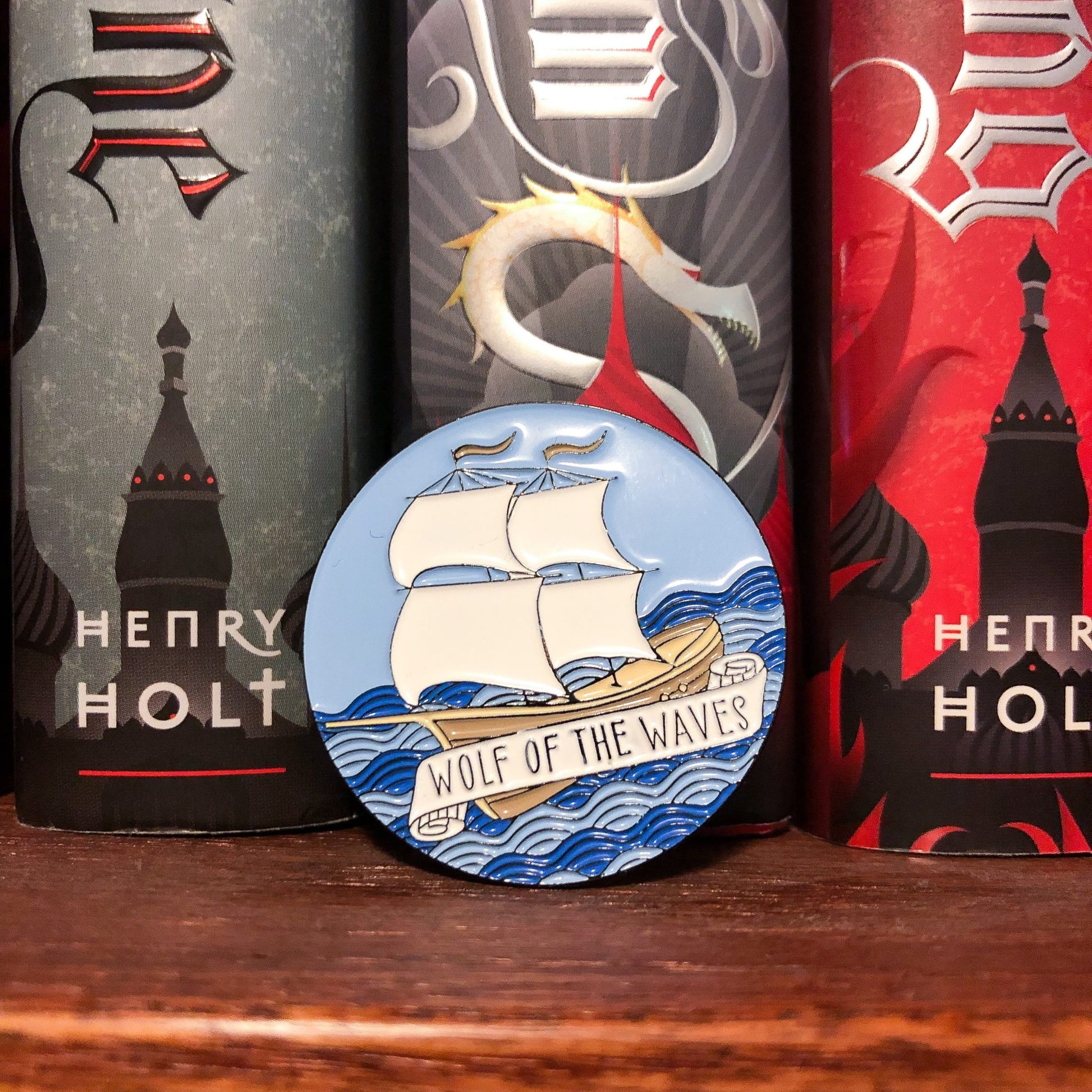 wolf of the waves sturmhond shadow and bone enamel pin with pirate ship on waves