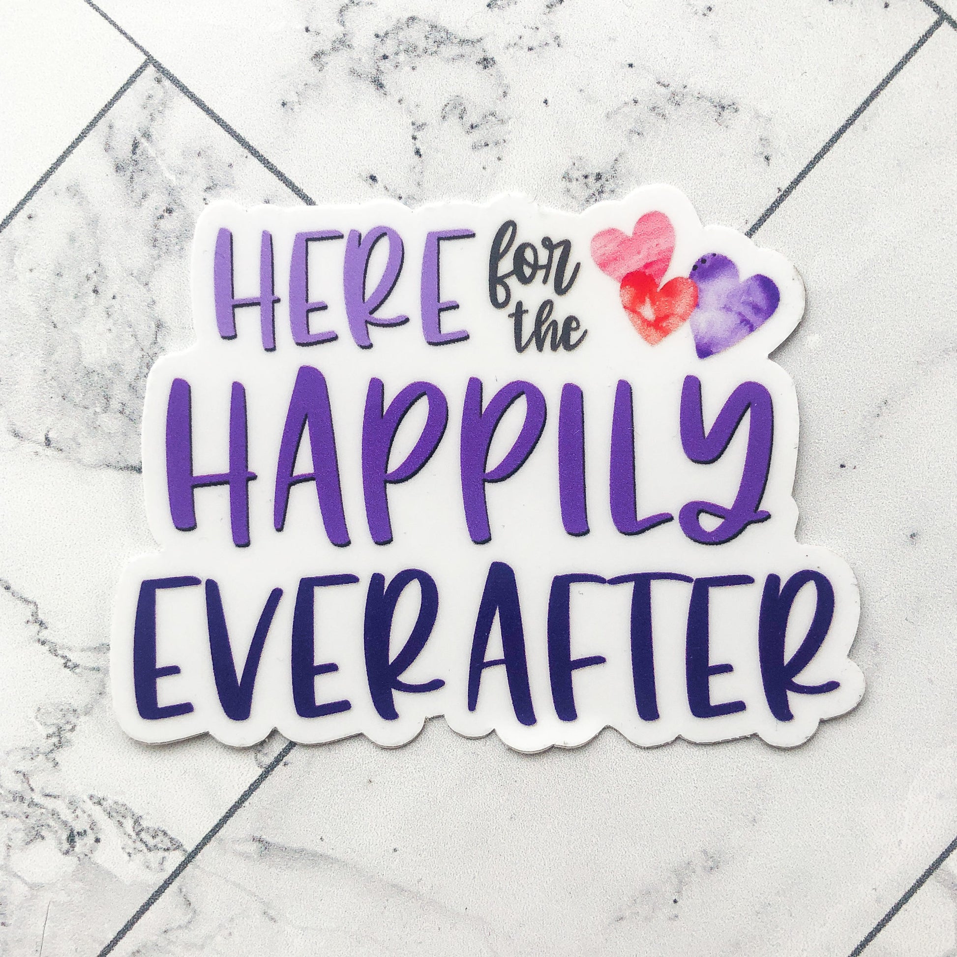 typography sticker saying here for the happily ever after in purples with watercolor red and pink hearts