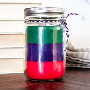 The Worlds of Sarah J. Maas · layered candle