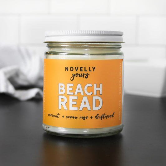 beach read coconut scented soy wax candle by novelly yours