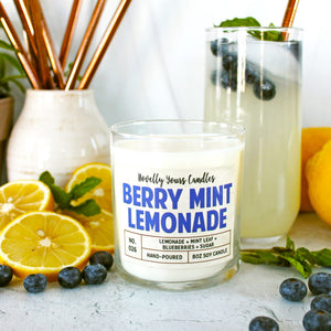 soy wax candle scented like lemonade and blueberry in clear jar with bronze lid