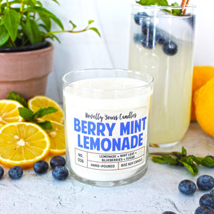 soy wax candle scented like lemonade and blueberry in clear jar with bronze lid