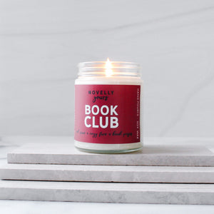 book club scented soy wax candle with fruit & fire scents with red label