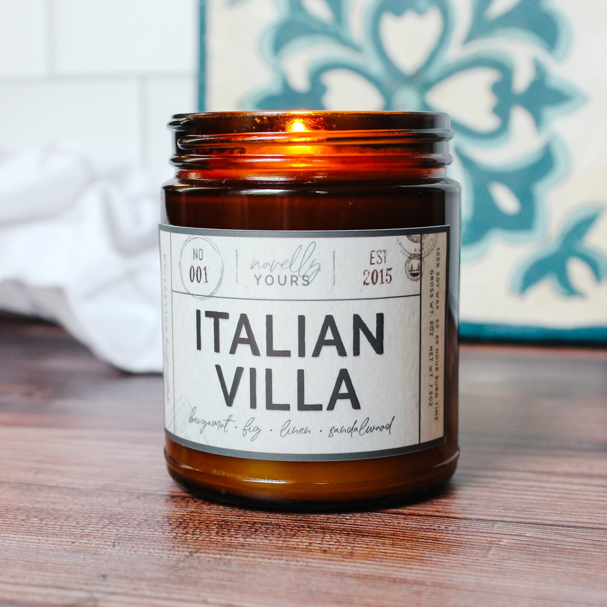 Italian villa scented soy wax candle in glass amber jar with black lid by novelly yours