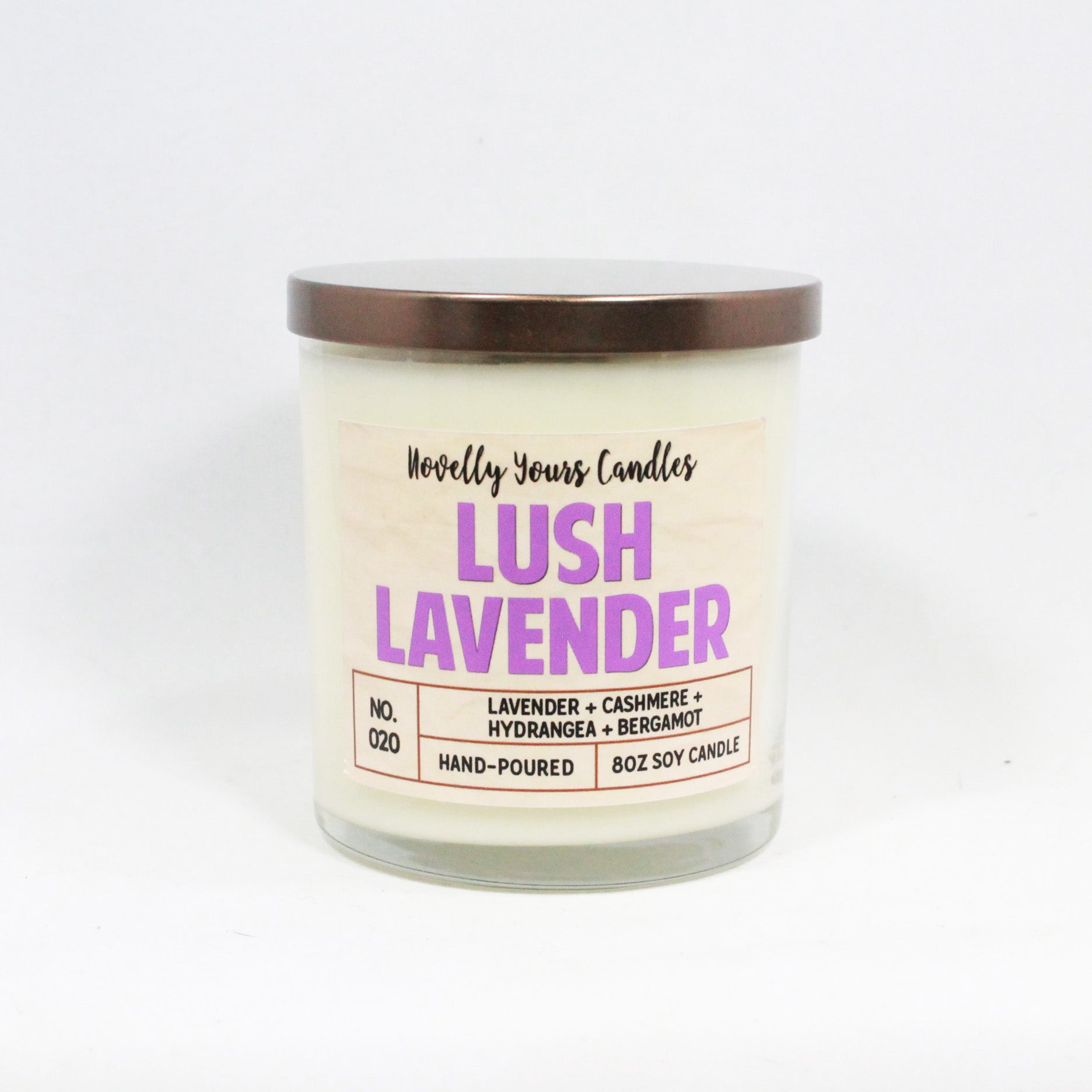 lush lavender scented soy wax candle in clear glass tumbler with bronze lid