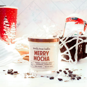 merry mocha scented soy wax candle in clear glass tumbler with bronze lid in rusty red text