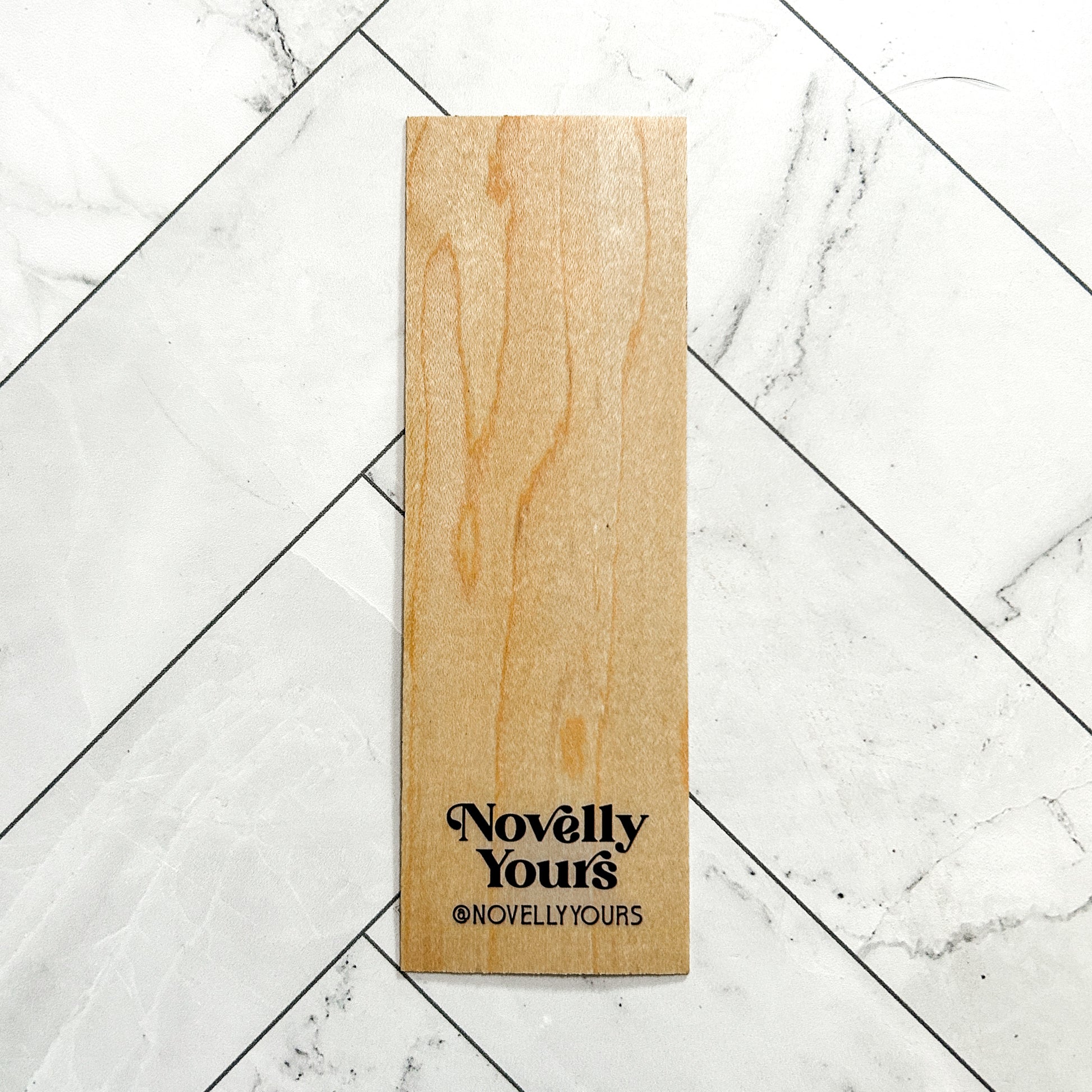 Novelly Yours wooden bookmark, back view with shop credit 