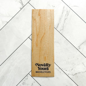 Novelly Yours wooden bookmark, back view with shop credit 