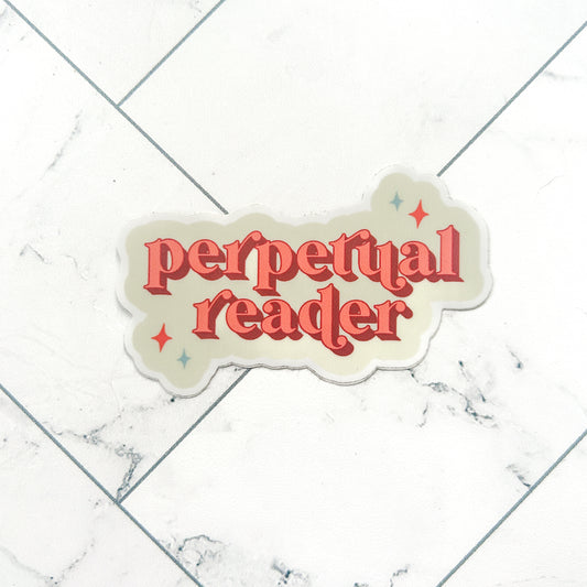 sticker for book lovers, perpetual reader sticker with retro font in orange with tan background and stars